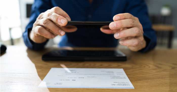 Prepaid cards with mobile check deposit